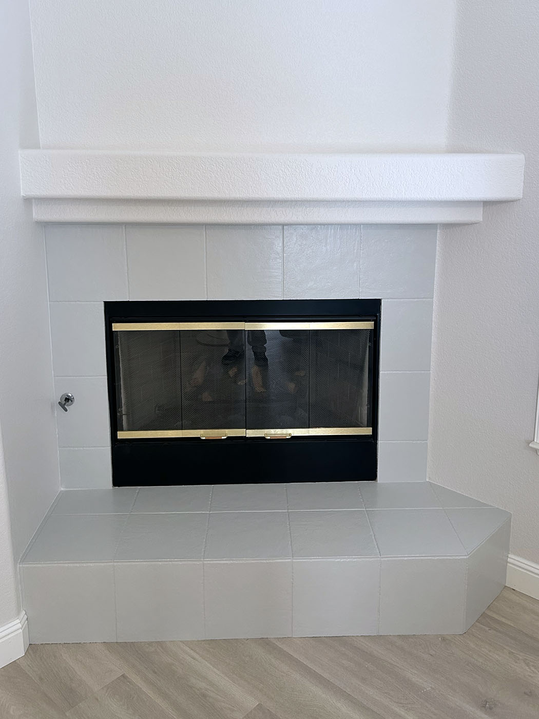 Fireplace area after painting